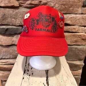 Red Farmmall‎ tractor cap with pins included.